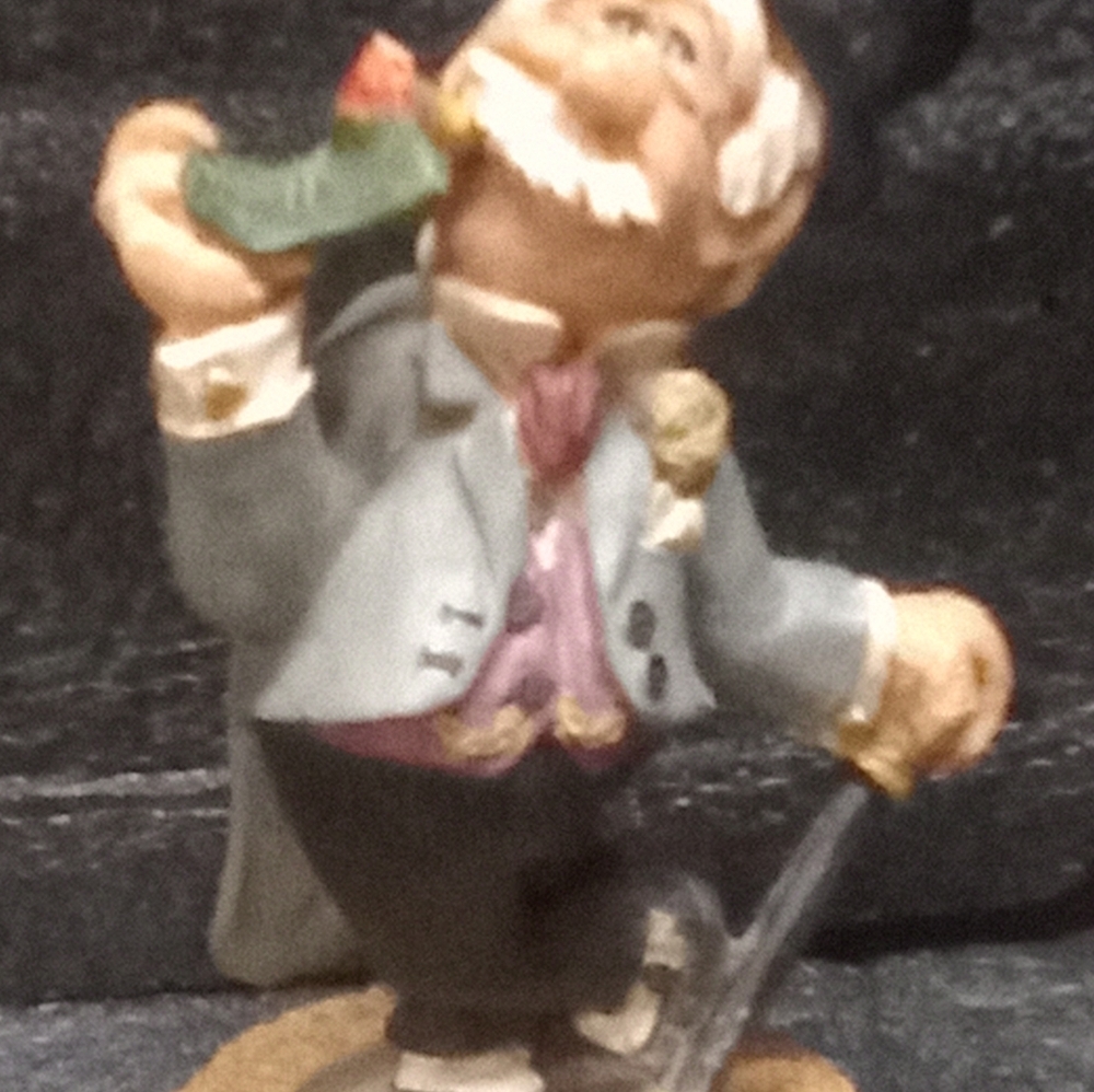 Charming Figurine with Top Hat and Bow Tie